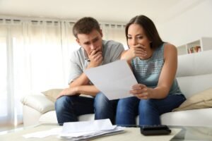 A couple looking at the documents