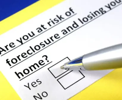A pen is pointing to the check box on a foreclosure and losing your home.